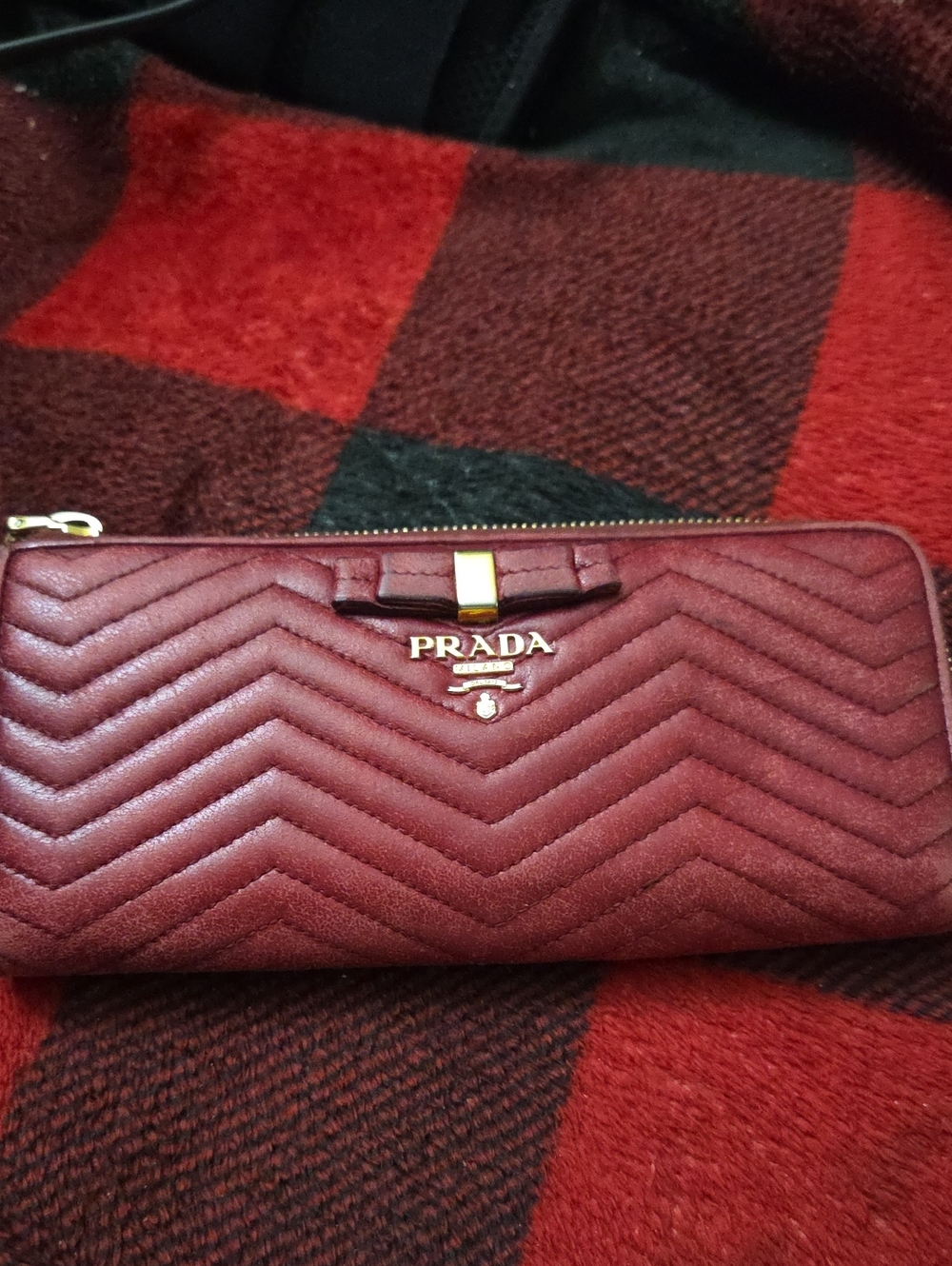 Prada Chevron Quilted Zip Wallet in Burgundy with Gold Hardware